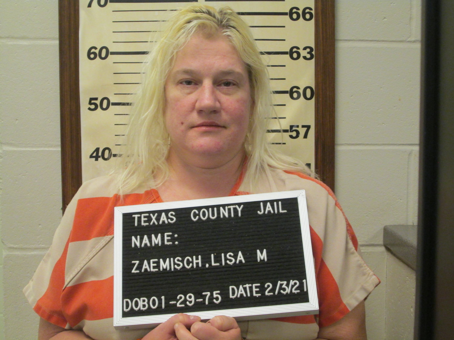 Lisa Zaemisch after being booked in Texas County Jail for an assault involving what was described as a “battle ax