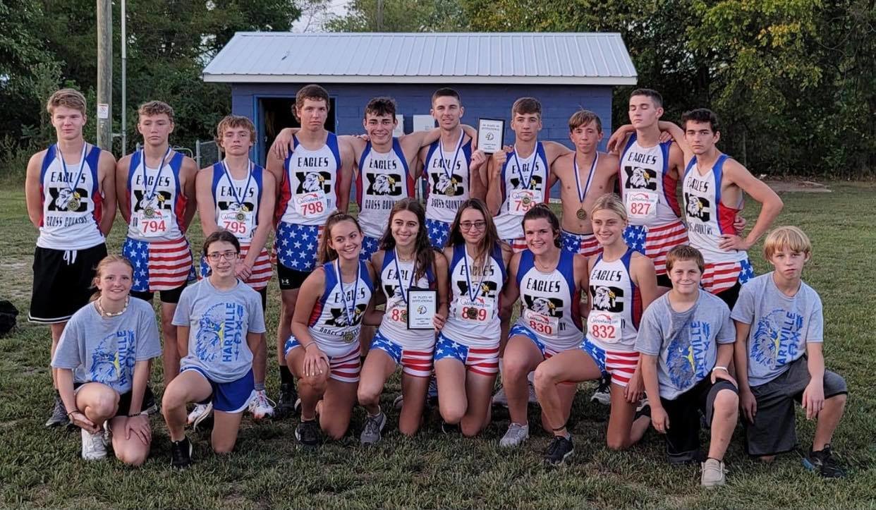 The Hartville cross country program after winning first at the race in Plato.